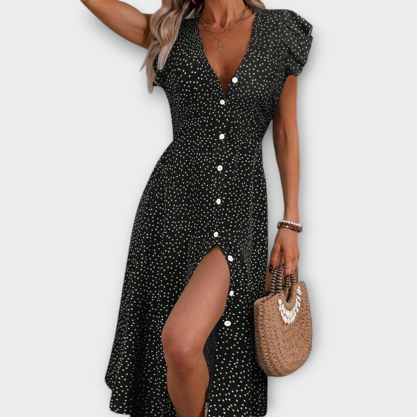 Elegante vestido midi con lunares