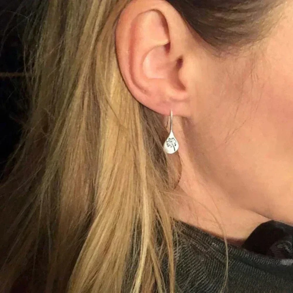 Pendientes de plata elegantes en diseño de hoja de diente de león