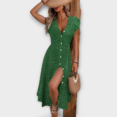 Elegante vestido midi con lunares