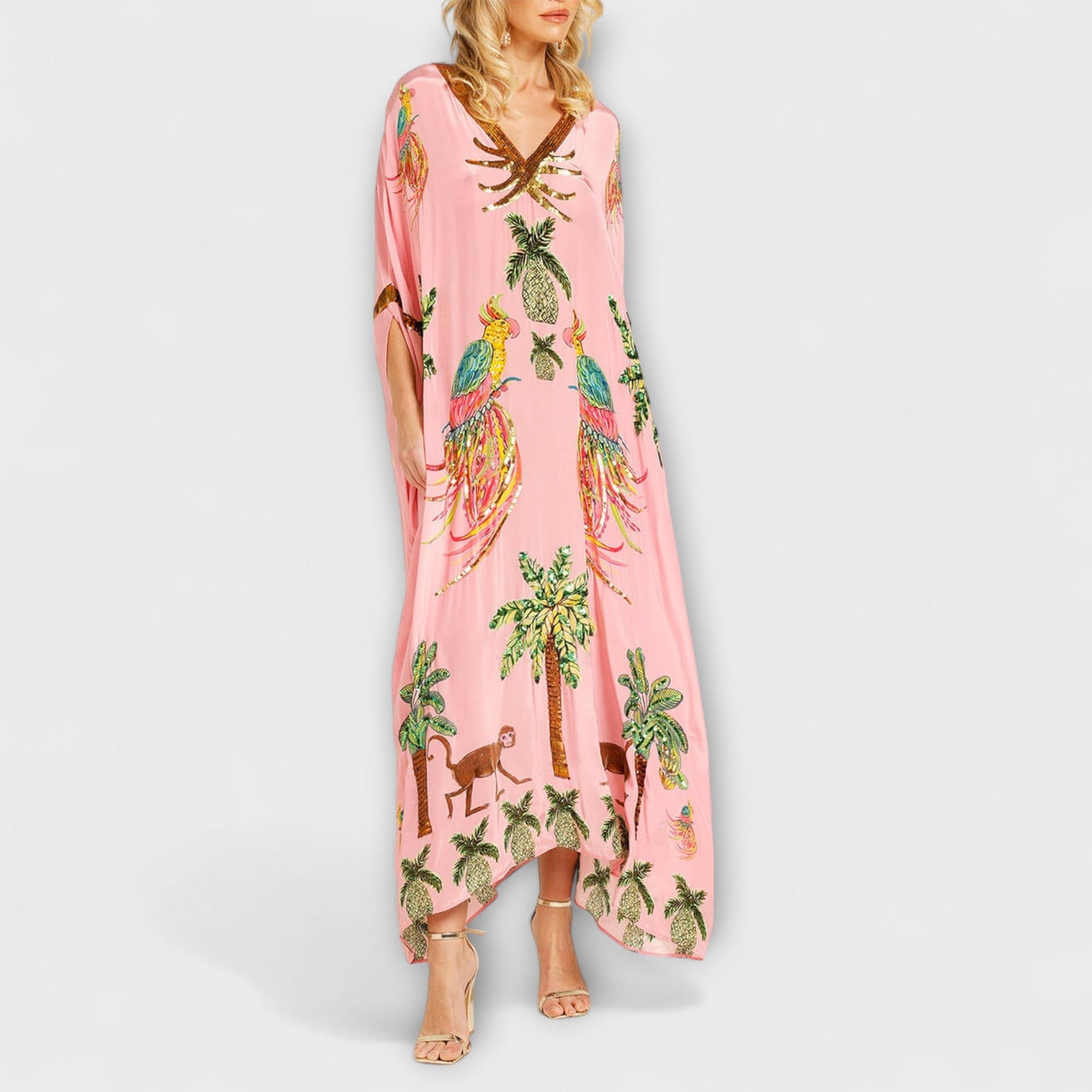 Linda - Vestido llamativo con hombros asimétricos y estampado de palmera