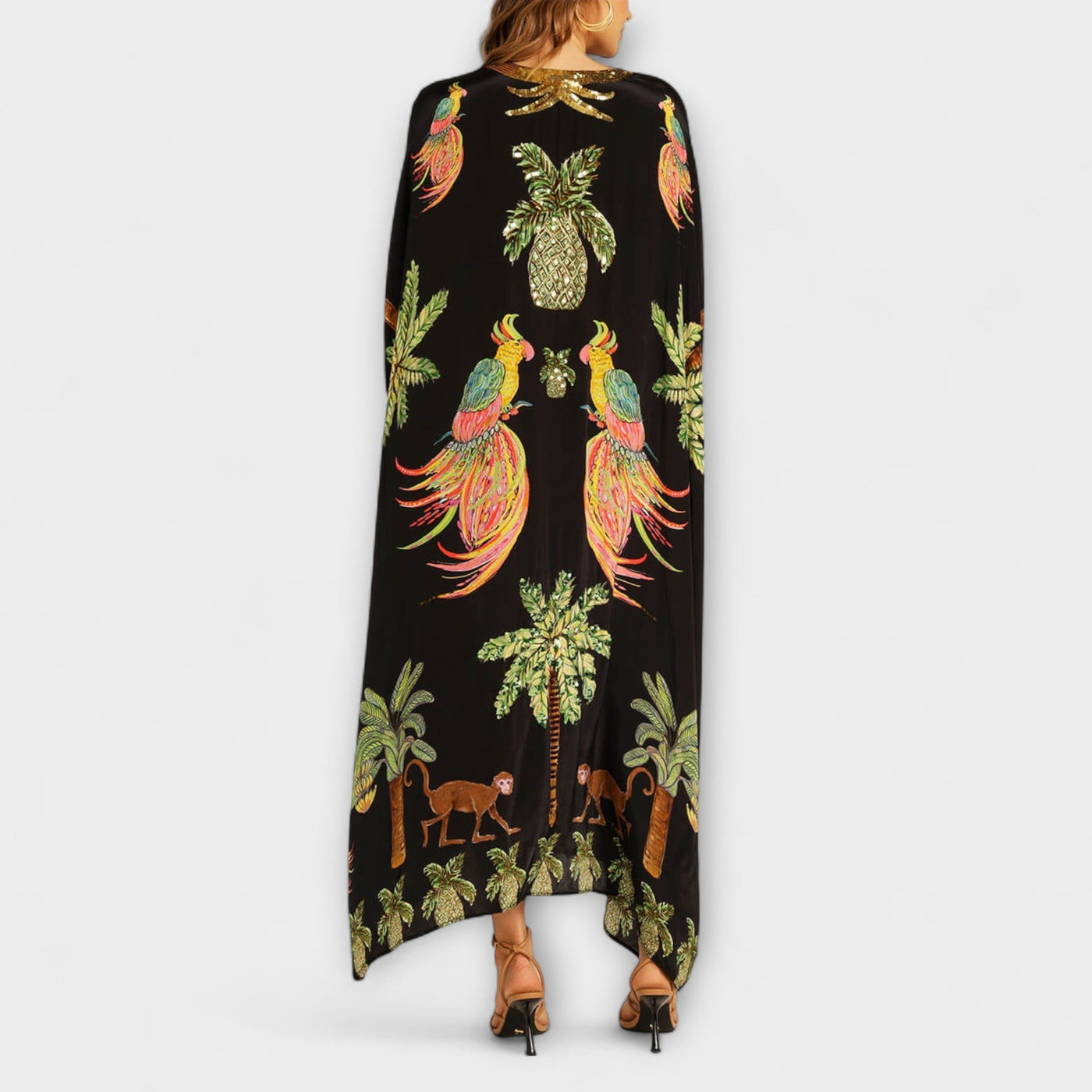 Linda - Vestido llamativo con hombros asimétricos y estampado de palmera