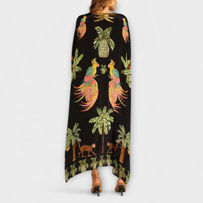 Linda - Vestido llamativo con hombros asimétricos y estampado de palmera